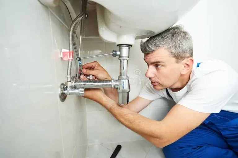 Man repairing tap